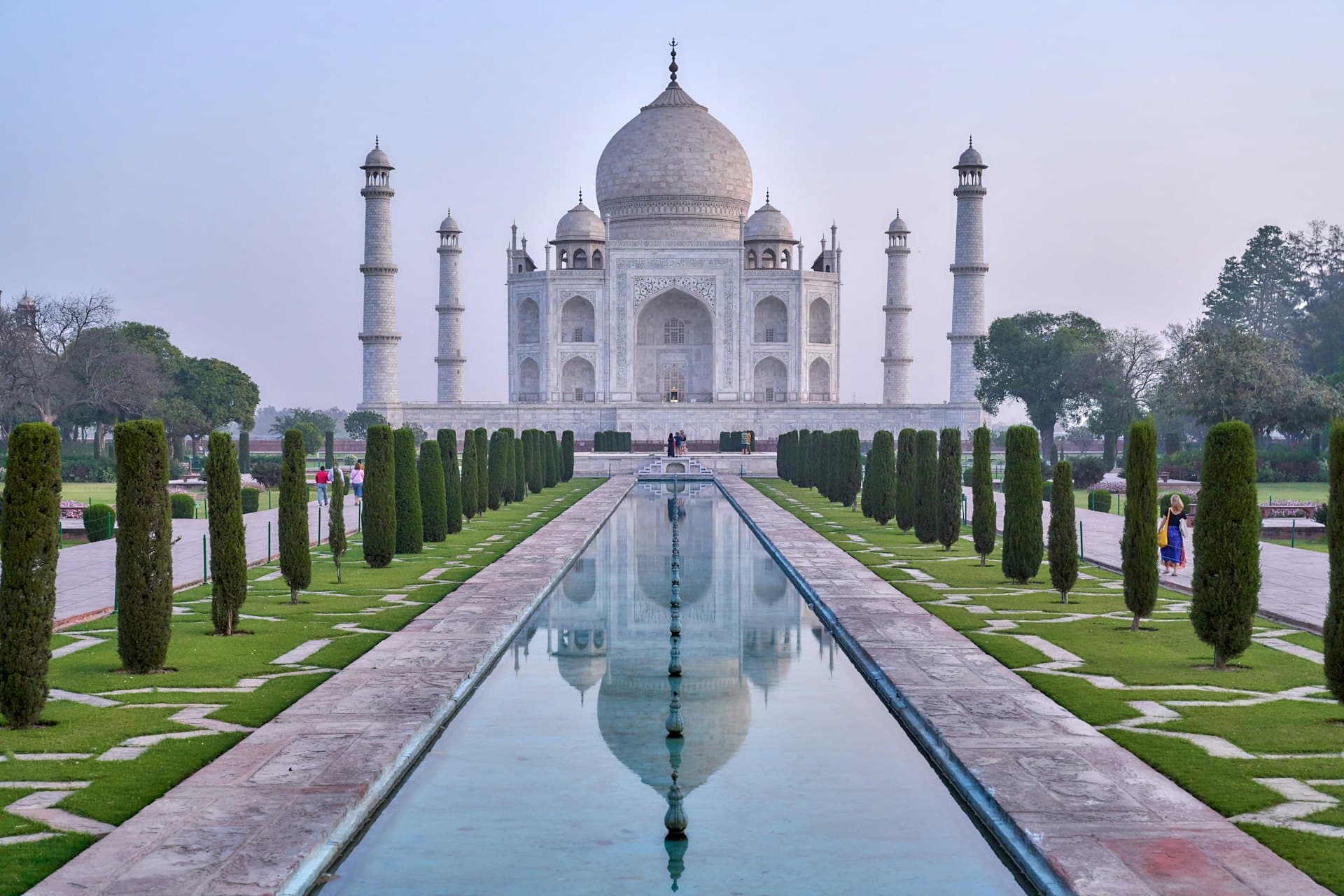 The Taj Mahal and its reflecting pool at dawn